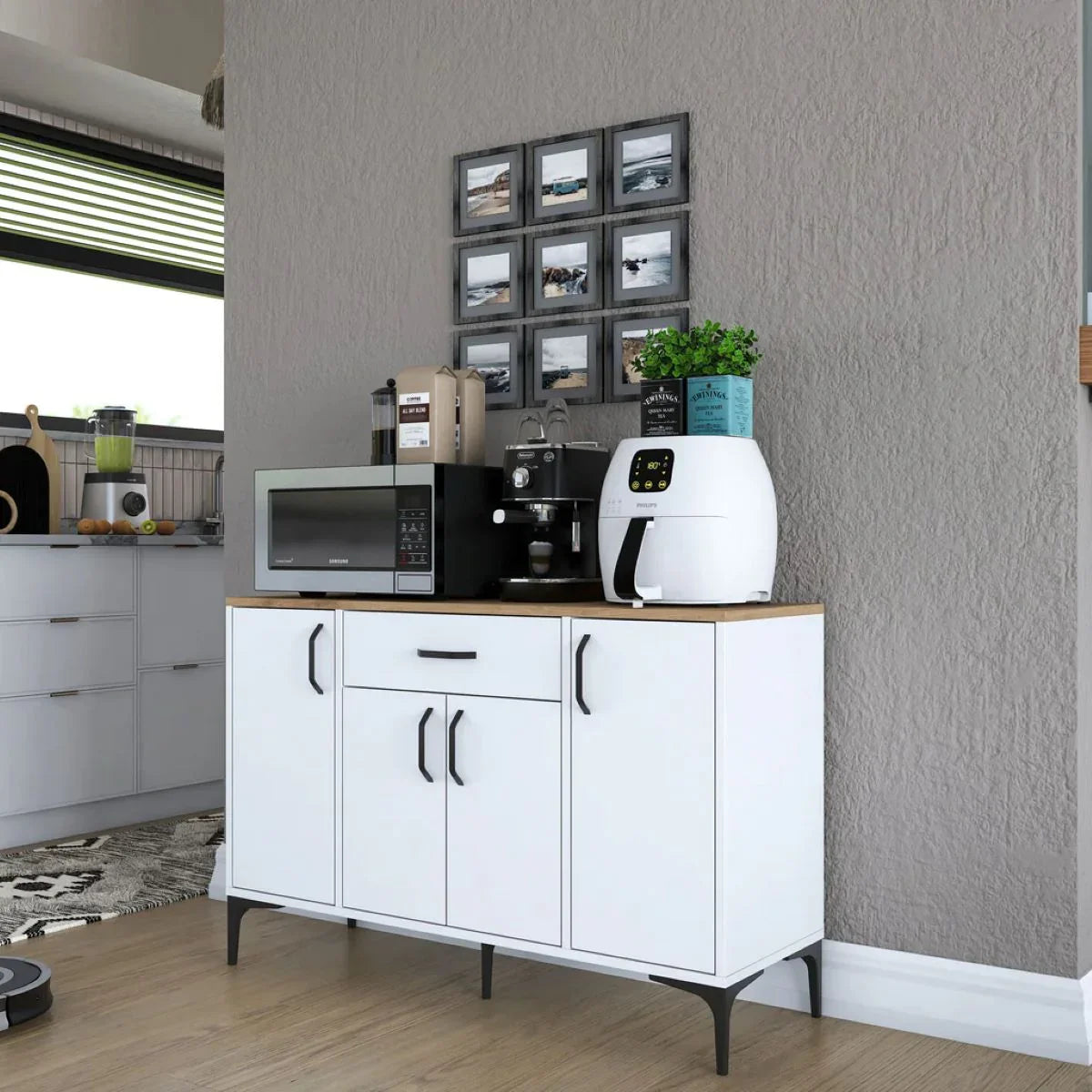 White kitchen cabinet with appliances against a gray wall