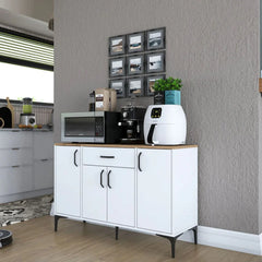 White kitchen cabinet with appliances against a gray wall