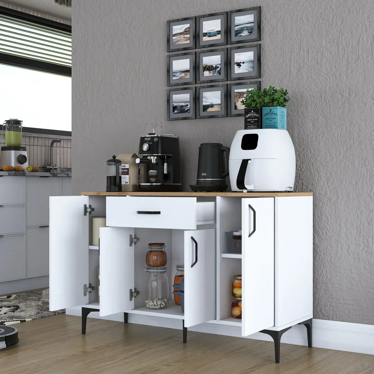White kitchen island with wooden countertop in a modern kitchen setting.