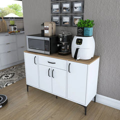White kitchen cabinet with wooden top holding kitchen appliances in a room.