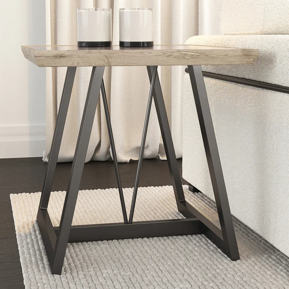 Small wooden table with metal legs in a room setting