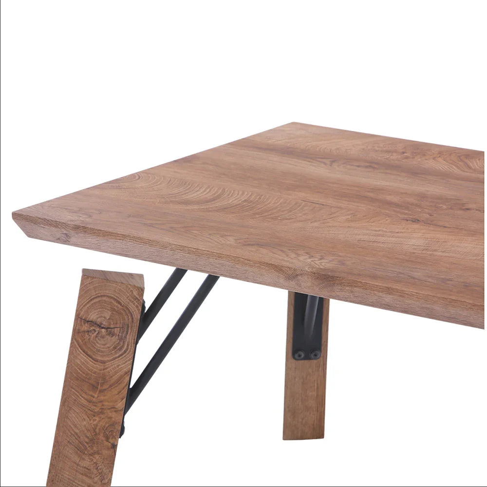 Wooden table with metal legs on a white background