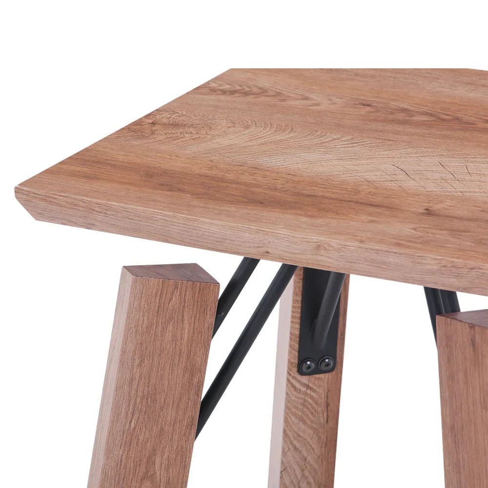 Wooden table with metal legs on a white background