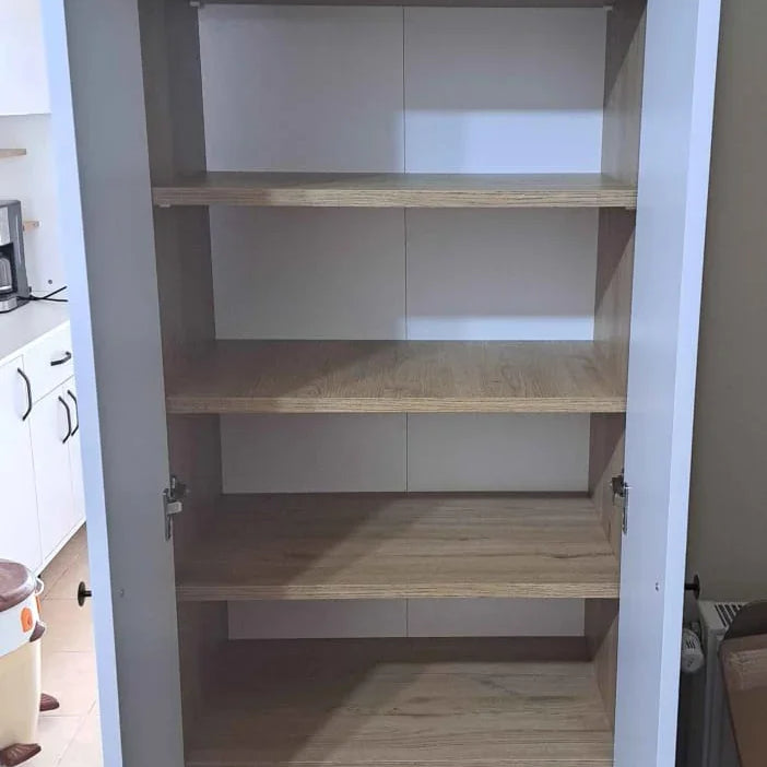 Wooden cabinet with open doors showing empty shelves in a kitchen setting.