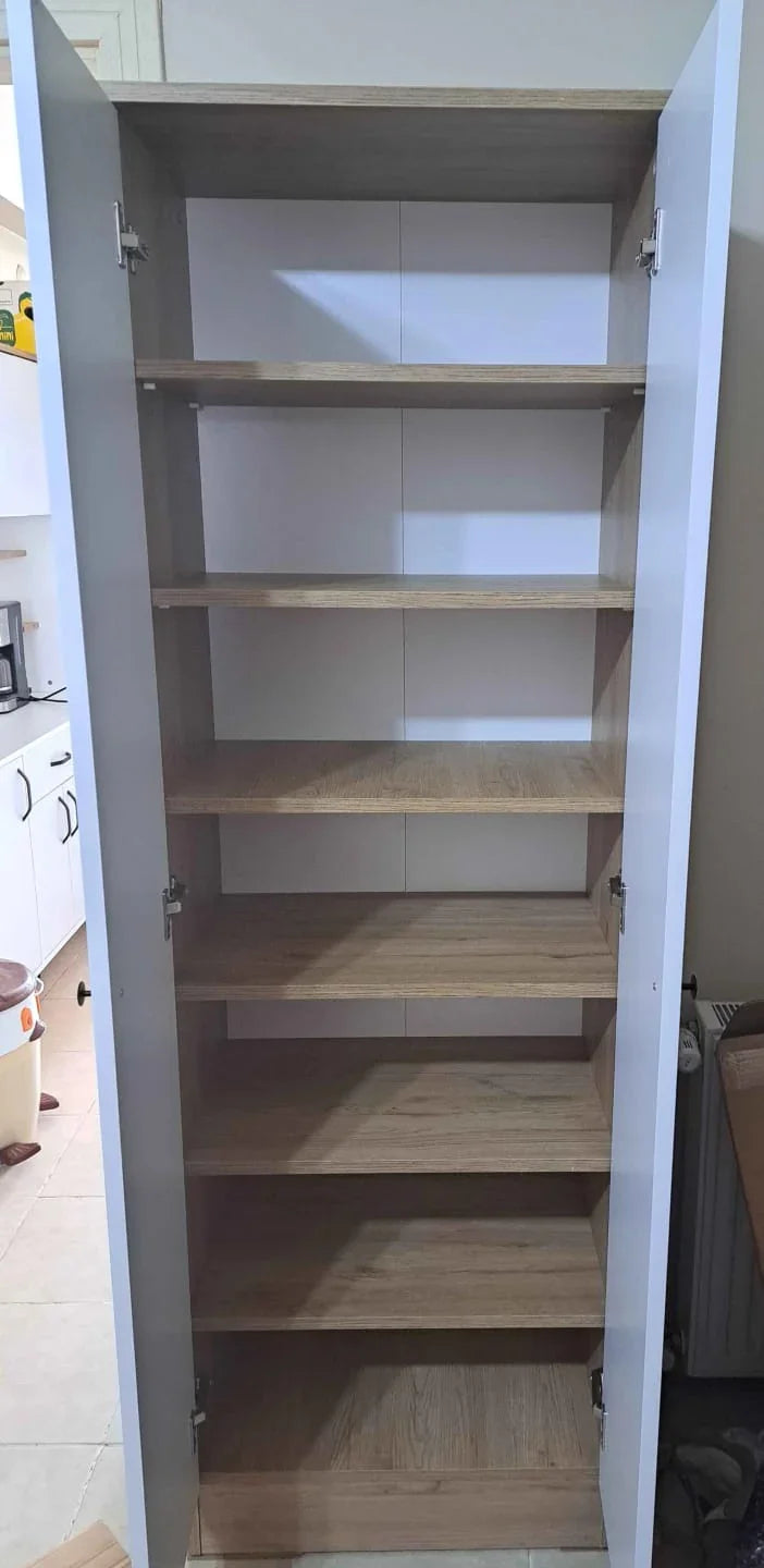 Wooden cabinet with open doors showing empty shelves in a kitchen setting.