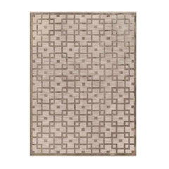 Rectangular area rug with a geometric pattern on a white background