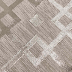 Patterned carpet with geometric design in brown and beige tones