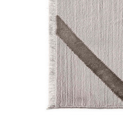 Gray rug with a diagonal stripe on a white background