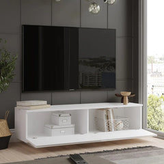 Modern living room with a white TV stand and a large flat-screen TV mounted on a gray wall.