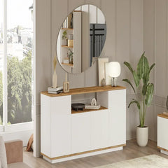 Modern interior design with a white cabinet, round mirror, and decorative items.