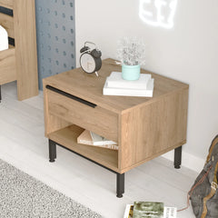 Wooden nightstand with decorative items in a bedroom setting