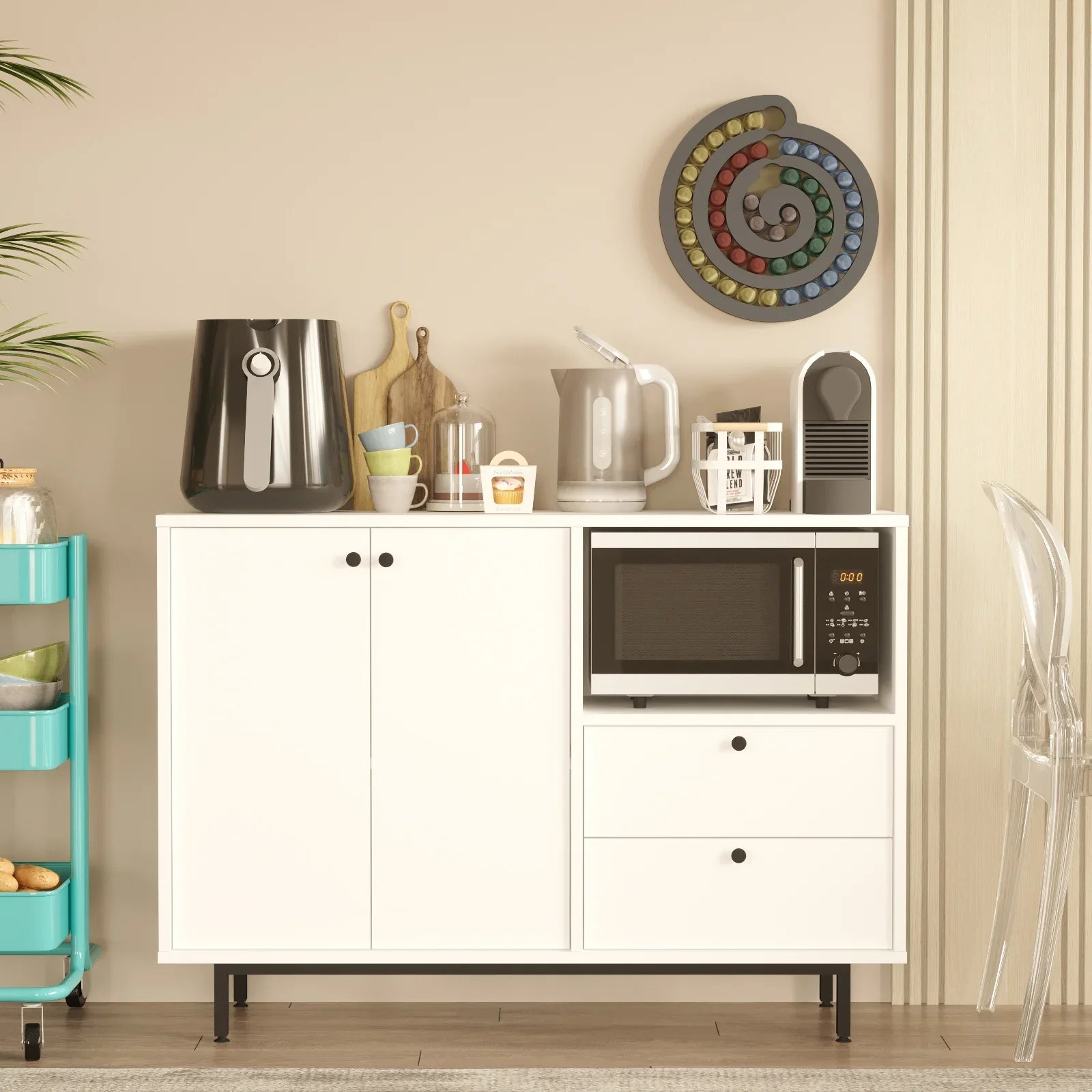 White kitchen cabinet with microwave, colorful wall clock, and various kitchen items.