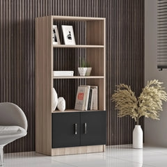 Wooden bookshelf with black lower section against a brown paneled wall.
