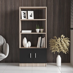 Modern bookshelf with decorative items against a wooden paneled wall.