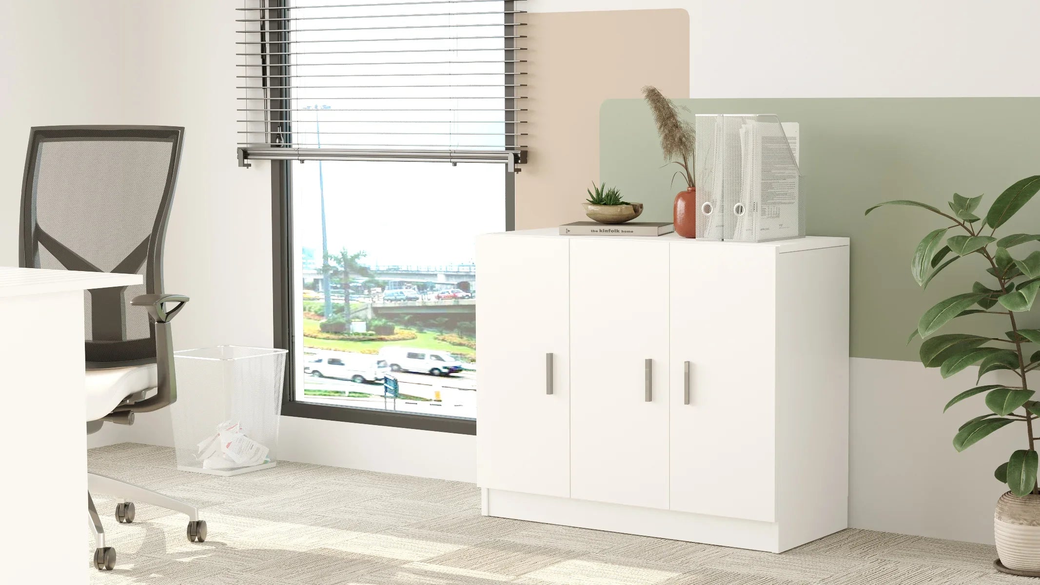 Modern office setup with a white desk, chair, and decorative elements.