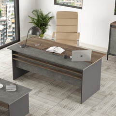 Modern office desk with a chair, laptop, and decor in a bright room.