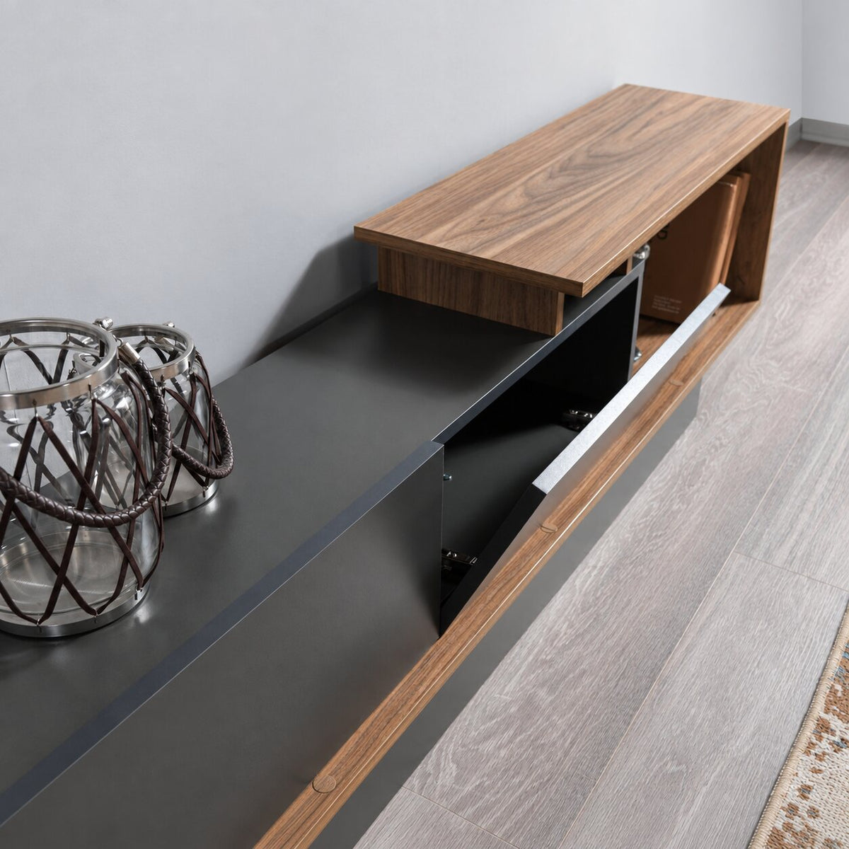 AshLine TV unit with open storage compartment and wood detailing